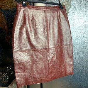 Wine colored Excelled genuine leather skirt.